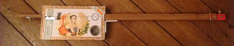 Handcraft cigar box guitar made by One String Is Enough for The Hummingbirds Project